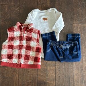 Red and White Checkered Vest with White Top and Blue Jeans